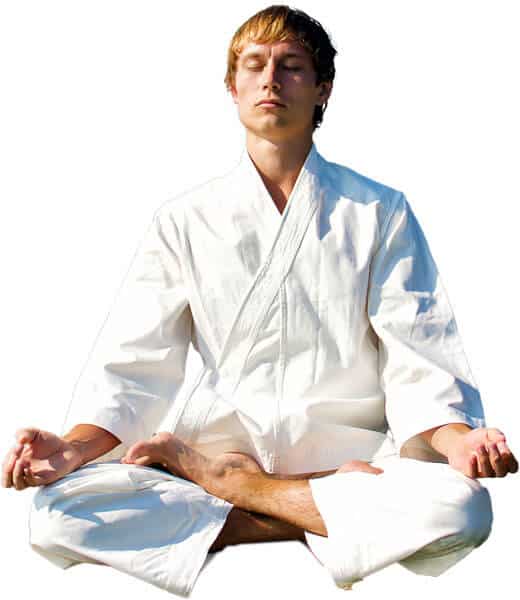 Martial Arts Lessons for Adults in Taylor TX - Young Man Thinking and Meditating in White